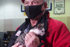 Mayoral Candidate Curtis Sliwa joins his wife and Upper West Side City Council Republican Candidate Nancy Sliwa for Early Voting at the Edward A. Reynolds West Side High School in New York City on 23 October 2021. They brought along Gizmo, the kitten they are fostering that will soon be up for adoption.