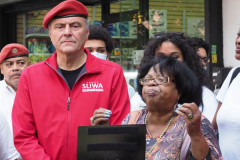 Mayoral Candidate Curtis Sliwa, and the Guardian Angels are joined by Carmen Quinones, President of the Douglass Houses Tenant Association for a Press Conference  at the crime scene at the corridor of West 104th St - West 105th on Columbus Ave that become an Alley of Gunshots and Shootings. Two people were shot, including an 81-year-old innocent bystander, outside NYC barbershop.
Photo By Beth Eisgrau-Heller