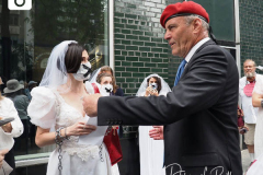 Curtis Sliwa, Republican Mayoral candidate for New York City, speaks with a member of the End Child Marriage Group outside the Manhattan office of New York Governor Andrew Cuomo in New York on 04 August 2021. Sliwa called for Governor Andrew Cuomo to step down amid the Attorney General's report backing up allegations that the Governor sexually harassed women.