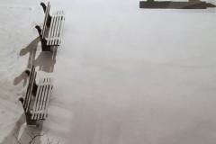 December 17,2020   Snow Storm hits New York City. Kids playing in the snow and adultsshoveling snow and cleaning off cars.