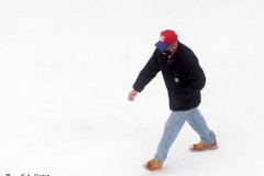 December 17,2020   Snow Storm hits New York City. Kids playing in the snow and adultsshoveling snow and cleaning off cars.