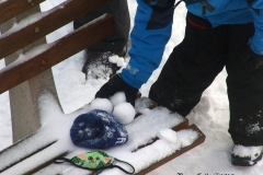 December 17,2020   Snow Storm hits New York City. Kids playing in the snow and adultsshoveling snow and cleaning off cars.