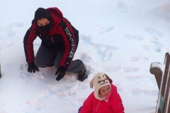 December 17,2020   Children playing outside after Snow Storm hits New York City. Children are having a brief respite from Covid 19 Pandemic with snowball fights and making snow angels and making snowmen.