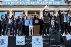 The New York City FC and fans celebrate the NYCFC 2021 MLS Cup Championship at City Hall in New York, New York, on Dec. 14,  2021. (Photo by Gabriele Holtermann/Sipa USA)
