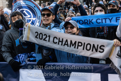 New York City FC fans celebrate the NYCFC 2021 MLS Cup Championship at City Hall in New York, New York, on Dec. 14,  2021. (Photo by Gabriele Holtermann/Sipa USA)