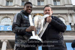 MLS Cup MVP Sean Johnson and head coach Ronny Deila hold the trophy at the NYCFC 2021 MLS Cup Championship celebration at City Hall in New York, New York, on Dec. 14,  2021. (Photo by Gabriele Holtermann/Sipa USA)