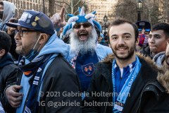 New York City FC fans celebrate the NYCFC 2021 MLS Cup Championship at City Hall in New York, New York, on Dec. 14,  2021. (Photo by Gabriele Holtermann/Sipa USA)