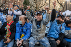 New York City FC fans celebrate the NYCFC 2021 MLS Cup Championship at City Hall in New York, New York, on Dec. 14,  2021. (Photo by Gabriele Holtermann/Sipa USA)