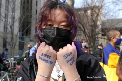 New York-  Solidarity March held in Chinatown
Black Transgender woman support the Asian community.