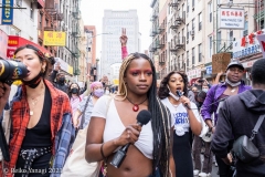 New York-  Solidarity March held in Chinatown
Black Transgender woman support the Asian community.