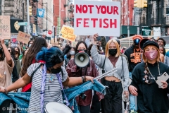 New York-  Solidarity March held in Chinatown
Black Transgender woman support the Asian community.