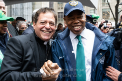 NYC Mayor Eric Adams greets a St. Patrick's Cathedral clergy member at the St.Patrick's Day Parade in New York, New York, on Mar. 17, 2022. (Photo by Gabriele Holtermann/Sipa USA)