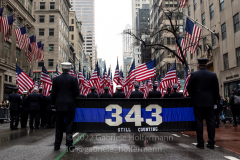 Holding a moment of silence for the victims of the 9/11 attacks, members of the FDNY face South towards Ground Zero during the St. Patrick's Day Parade in New York, New York, on Mar. 17, 2022. (Photo by Gabriele Holtermann/Sipa USA)