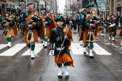 A young person leads a pipe and drum band during the St. Patrick's Day Parade in New York, NY, on Mar. 17, 2022. (Photo by Gabriele Holtermann/Sipa USA)