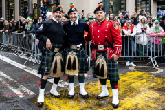 Marching band members pose for a photo at the St. Patrick's Day Parade in New York, New York, on Mar. 17, 2022. (Photo by Gabriele Holtermann/Sipa USA)