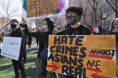Members and supporters of the Asian-American community attend a "rally against hate" at Columbus Park in New York City on 21 March 2021. Three massage parlors around Atlanta were targeted March 16, 2021, and a 21-year-old suspect was arrested. Robert Aaron Long faces eight counts of murder and one charge of aggravated assault.