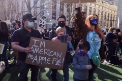 Members and supporters of the Asian-American community attend a "rally against hate" at Columbus Park in New York City. Three massage parlors around Atlanta were targeted March 16, 2021, and a 21-year-old suspect was arrested. Robert Aaron Long faces eight counts of murder and one charge of aggravated assault.