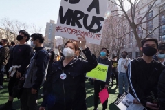 Members and supporters of the Asian-American community attend a "rally against hate" at Columbus Park in New York City. Three massage parlors around Atlanta were targeted March 16, 2021, and a 21-year-old suspect was arrested. Robert Aaron Long faces eight counts of murder and one charge of aggravated assault.