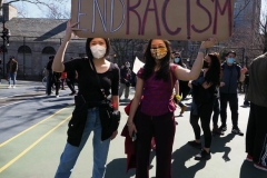 Members and supporters of the Asian-American community attend a "rally against hate" at Columbus Park in New York City. Three massage parlors around Atlanta were targeted March 16, 2021, and a 21-year-old suspect was arrested. Robert Aaron Long faces eight counts of murder and one charge of aggravated assault.