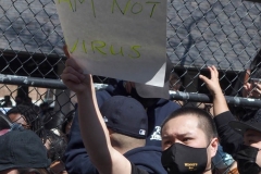 Members and supporters of the Asian-American community attend a "rally against hate" at Columbus Park in New York City. Three massage parlors around Atlanta were targeted March 16, 2021, and a 21-year-old suspect was arrested. Robert Aaron Long faces eight counts of murder and one charge of aggravated assault.