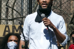 Members and supporters of the Asian-American community attend a "rally against hate" at Columbus Park in New York City. Three massage parlors around Atlanta were targeted March 16, 2021, and a 21-year-old suspect was arrested. Robert Aaron Long faces eight counts of murder and one charge of aggravated assault.