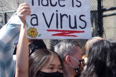 Members and supporters of the Asian-American community attend a "rally against hate" at Columbus Park in New York City. Three massage parlors around Atlanta were targeted March 16, 2021, and a 21-year-old suspect was arrested. Robert Aaron Long faces eight counts of murder and one charge of aggravated assault.