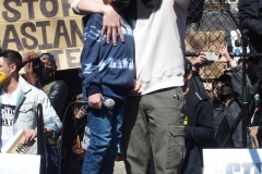 Members and supporters of the Asian-American community attend a "rally against hate" at Columbus Park in New York City. Three massage parlors around Atlanta were targeted March 16, 2021, and a 21-year-old suspect was arrested. Robert Aaron Long faces eight counts of murder and one charge of aggravated assault.