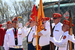 Street Naming
Lilac Court and Forest Avenue
Mariners Harbor
Staten Island, NY
April 22, 2022
Photographs by Mary DiBiase Blaich

The interaction of Lilac Court and Forest Avenue was renamed in a ceremony on Friday, April 22, 2022 for Nicholas M Troianiello, a World War II veteran of the Battle of Iwo Jima who served with the Marines.  Upon returning from service, he joined the FDNY and rose to the rank of Lieutenant, serving in Ladder 15 in Manhattan. He was a Purple Heart recipient.
At the ceremony, many groups gathered to honor Mr Troianiello including The Marine Corps League, the FDNY Retirees Association and current members of the FDNY.  Also in attendance were Congresswoman Nicole Malliotakis; Boro President Vito Fossella;  City Councilwoman Kamillah Hanks and two color guards: Marines 6th Communication Battalion and the FDNY Ceremonial Unit.  The Marine Corps League gave a 21 gun salute, and Frank Montella played Taps.  Carmella Montella needed a box to reach the microphone as she delivered the Invocation.