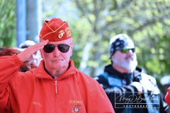 Street Naming
Lilac Court and Forest Avenue
Mariners Harbor
Staten Island, NY
April 22, 2022
Photographs by Mary DiBiase Blaich

The interaction of Lilac Court and Forest Avenue was renamed in a ceremony on Friday, April 22, 2022 for Nicholas M Troianiello, a World War II veteran of the Battle of Iwo Jima who served with the Marines.  Upon returning from service, he joined the FDNY and rose to the rank of Lieutenant, serving in Ladder 15 in Manhattan. He was a Purple Heart recipient.
At the ceremony, many groups gathered to honor Mr Troianiello including The Marine Corps League, the FDNY Retirees Association and current members of the FDNY.  Also in attendance were Congresswoman Nicole Malliotakis; Boro President Vito Fossella;  City Councilwoman Kamillah Hanks and two color guards: Marines 6th Communication Battalion and the FDNY Ceremonial Unit.  The Marine Corps League gave a 21 gun salute, and Frank Montella played Taps.  Carmella Montella needed a box to reach the microphone as she delivered the Invocation.