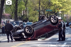 A Honda Accord and a Honda CR-V SUV collided on Amsterdam Avenue and West 113rd Street in Manhattan, causing the SUV to flip over. Witnesses were unsure of the details but say they believe the Honda Accord was going at an excessive speed and the SUV swerved, causing it to flip over. Both drivers were brought to the hospital.