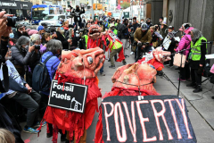 Members of Extinction Rebellion (XR) marked Tax Day with the "No Wars, No Warming" demonstration outside a federal building in NYC where Internal Revenue Service (IRS) have offices "to demand that our tax money stop being used to fund endless war and environmental destruction”, on April 18, 2022 (Photo by Slaven Vlasic)
