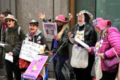 Members of Extinction Rebellion (XR) marked Tax Day with the "No Wars, No Warming" demonstration outside a federal building in NYC where Internal Revenue Service (IRS) have offices "to demand that our tax money stop being used to fund endless war and environmental destruction”, on April 18, 2022 (Photo by Slaven Vlasic)