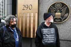 Members of Extinction Rebellion (XR) marked Tax Day with the "No Wars, No Warming" demonstration outside a federal building in NYC where Internal Revenue Service (IRS) have offices "to demand that our tax money stop being used to fund endless war and environmental destruction”, on April 18, 2022 (Photo by Slaven Vlasic)