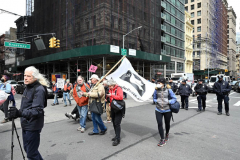 Members of Extinction Rebellion (XR) marked Tax Day with the "No Wars, No Warming" demonstration outside a federal building in NYC where Internal Revenue Service (IRS) have offices "to demand that our tax money stop being used to fund endless war and environmental destruction”, on April 18, 2022 (Photo by Slaven Vlasic)