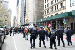Members of Extinction Rebellion (XR) marked Tax Day with the "No Wars, No Warming" demonstration outside a federal building in NYC where Internal Revenue Service (IRS) have offices "to demand that our tax money stop being used to fund endless war and environmental destruction”, on April 18, 2022 (Photo by Slaven Vlasic)