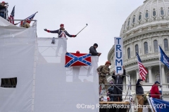 Supporters of President Donald Trump hold their ground after storming the United States Capitol in Washington, D.C., Wednesday, Jan. 6, 2020, as they protest the electoral college certification of President-Elect Joe Biden.