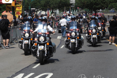 Essential workers are honored during the Hometown Heroes Ticker-tape Parade along the Canyon of Heroes on July 7, 2021 in New York. The parade included a variety of different floats, representing the groups of essential workers who served this city heroically throughout the pandemic.