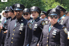 Essential workers are honored during the Hometown Heroes Ticker-tape Parade along the Canyon of Heroes on July 7, 2021 in New York. The parade included a variety of different floats, representing the groups of essential workers who served this city heroically throughout the pandemic.