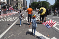 Essential workers are honored during the Hometown Heroes Ticker-tape Parade along the Canyon of Heroes on July 7, 2021 in New York. The parade included a variety of different floats, representing the groups of essential workers who served this city heroically throughout the pandemic.