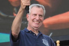 Mayor Bill de Blasio attends the Hometown Heroes Ticker-tape Parade along the Canyon of Heroes on July 7, 2021 in New York. The parade included a variety of different floats, representing the groups of essential workers who served this city heroically throughout the pandemic.