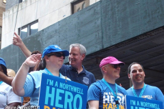 Salute to the HomeTown Heroes Ticker-Tape Parade to honor essential workers. The parade started in Battery Park and made its way up  Broadway (Canyon of Heroes) to City Hall  where NYC Mayor Bill de Blasio greeted them. The City Hall ceremony was modified because of the extreme heat today. The parade  featured 10 bands and 14 specialty vehicles. 
 The floats  departed in the following order, beginning with  
1.     Hospital Workers
2.     Healthcare Workers
3.     Education & Childcare
4.     First Responders
5.     Community Care
6.     City Workers
7.     Advocacy Organizations
8.     Transportation
9.     Hospitality & Building Care
10.  Emergency Food
11.  Communication & Delivery
12.  Small Businesses & Bodega
13.  Utilities
14.  Reinforcements