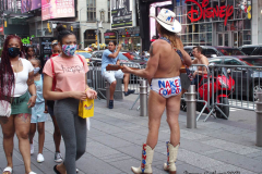 New York's Times Square is getting back to business even though the Delta Variant  number of cases are starting to creep up.
The Naked Cowboy,The  Naked Cowgirl, The Costume Characters were all outside on a beautiful day trying to make money. Some other strange folks were also enjoying the sights as well.