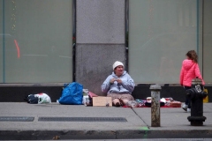 New York City. "The Crossroads of the World" 
Times Square. Andy Golub Artist/Founder of Human Connection Arts paints 3 models in Times square, as onlookers watch and street performers and costume characters entertain
vistors.