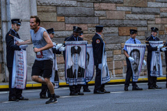 The Tunnel to Tower 5k run and walk in NYC filled with runners of all kinds to commemorate the run on 9/11 of Fireman Stephen Siller from Brooklyn to Manhattan through the Hugh L. Carey tunnel.
The run pays tribute to the 343 FDNY firefighters, 71 law enforcement officers and thousands of civilians who lost their lives on that catastrophic day 20 years ago. All proceeds to the event go to supporting those of first responders and injured service members. 
Service members adorned with images of those lost and holding flags lined the streets in support of the runners as they passed through the tunnel and ran their way through lower Manhattan to the finish line. (C) Bianca Otero, September 26, 2021