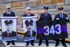 The Tunnel to Tower 5k run and walk in NYC filled with runners of all kinds to commemorate the run on 9/11 of Fireman Stephen Siller from Brooklyn to Manhattan through the Hugh L. Carey tunnel.
The run pays tribute to the 343 FDNY firefighters, 71 law enforcement officers and thousands of civilians who lost their lives on that catastrophic day 20 years ago. All proceeds to the event go to supporting those of first responders and injured service members. 
Service members adorned with images of those lost and holding flags lined the streets in support of the runners as they passed through the tunnel and ran their way through lower Manhattan to the finish line. (C) Bianca Otero, September 26, 2021