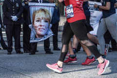 The Tunnel to Tower 5k run and walk in NYC filled with runners of all kinds to commemorate the run on 9/11 of Fireman Stephen Siller from Brooklyn to Manhattan through the Hugh L. Carey tunnel.
The run pays tribute to the 343 FDNY firefighters, 71 law enforcement officers and thousands of civilians who lost their lives on that catastrophic day 20 years ago. All proceeds to the event go to supporting those of first responders and injured service members. 
Service members adorned with images of those lost and holding flags lined the streets in support of the runners as they passed through the tunnel and ran their way through lower Manhattan to the finish line. (C) Bianca Otero, September 26, 2021