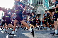 The Tunnel to Tower 5k run and walk in NYC filled with runners of all kinds to commemorate the run on 9/11 of Fireman Stephen Siller from Brooklyn to Manhattan through the Hugh L. Carey tunnel.
The run pays tribute to the 343 FDNY firefighters, 71 law enforcement officers and thousands of civilians who lost their lives on that catastrophic day 20 years ago. All proceeds to the event go to supporting those of first responders and injured service members. 
Service members adorned with images of those lost and holding flags lined the streets in support of the runners as they passed through the tunnel and ran their way through lower Manhattan to the finish line. (C) Bianca Otero, September 26, 2021
