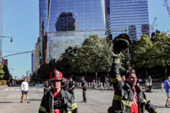The Tunnel to Tower 5k run and walk in NYC filled with runners of all kinds to commemorate the run on 9/11 of Fireman Stephen Siller from Brooklyn to Manhattan through the Hugh L. Carey tunnel.
The run pays tribute to the 343 FDNY firefighters, 71 law enforcement officers and thousands of civilians who lost their lives on that catastrophic day 20 years ago. All proceeds to the event go to supporting those of first responders and injured service members. 
Service members adorned with images of those lost and holding flags lined the streets in support of the runners as they passed through the tunnel and ran their way through lower Manhattan to the finish line. (C) Bianca Otero, September 26, 2021