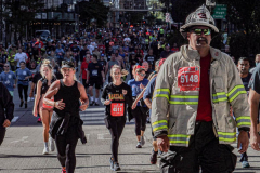 The Tunnel to Tower 5k run and walk in NYC filled with runners of all kinds to commemorate the run on 9/11 of Fireman Stephen Siller from Brooklyn to Manhattan through the Hugh L. Carey tunnel.
The run pays tribute to the 343 FDNY firefighters, 71 law enforcement officers and thousands of civilians who lost their lives on that catastrophic day 20 years ago. All proceeds to the event go to supporting those of first responders and injured service members. 
Service members adorned with images of those lost and holding flags lined the streets in support of the runners as they passed through the tunnel and ran their way through lower Manhattan to the finish line. (C) Bianca Otero, September 26, 2021