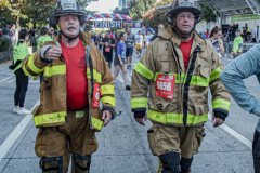 The Tunnel to Tower 5k run and walk in NYC filled with runners of all kinds to commemorate the run on 9/11 of Fireman Stephen Siller from Brooklyn to Manhattan through the Hugh L. Carey tunnel.
The run pays tribute to the 343 FDNY firefighters, 71 law enforcement officers and thousands of civilians who lost their lives on that catastrophic day 20 years ago. All proceeds to the event go to supporting those of first responders and injured service members. 
Service members adorned with images of those lost and holding flags lined the streets in support of the runners as they passed through the tunnel and ran their way through lower Manhattan to the finish line. (C) Bianca Otero, September 26, 2021
